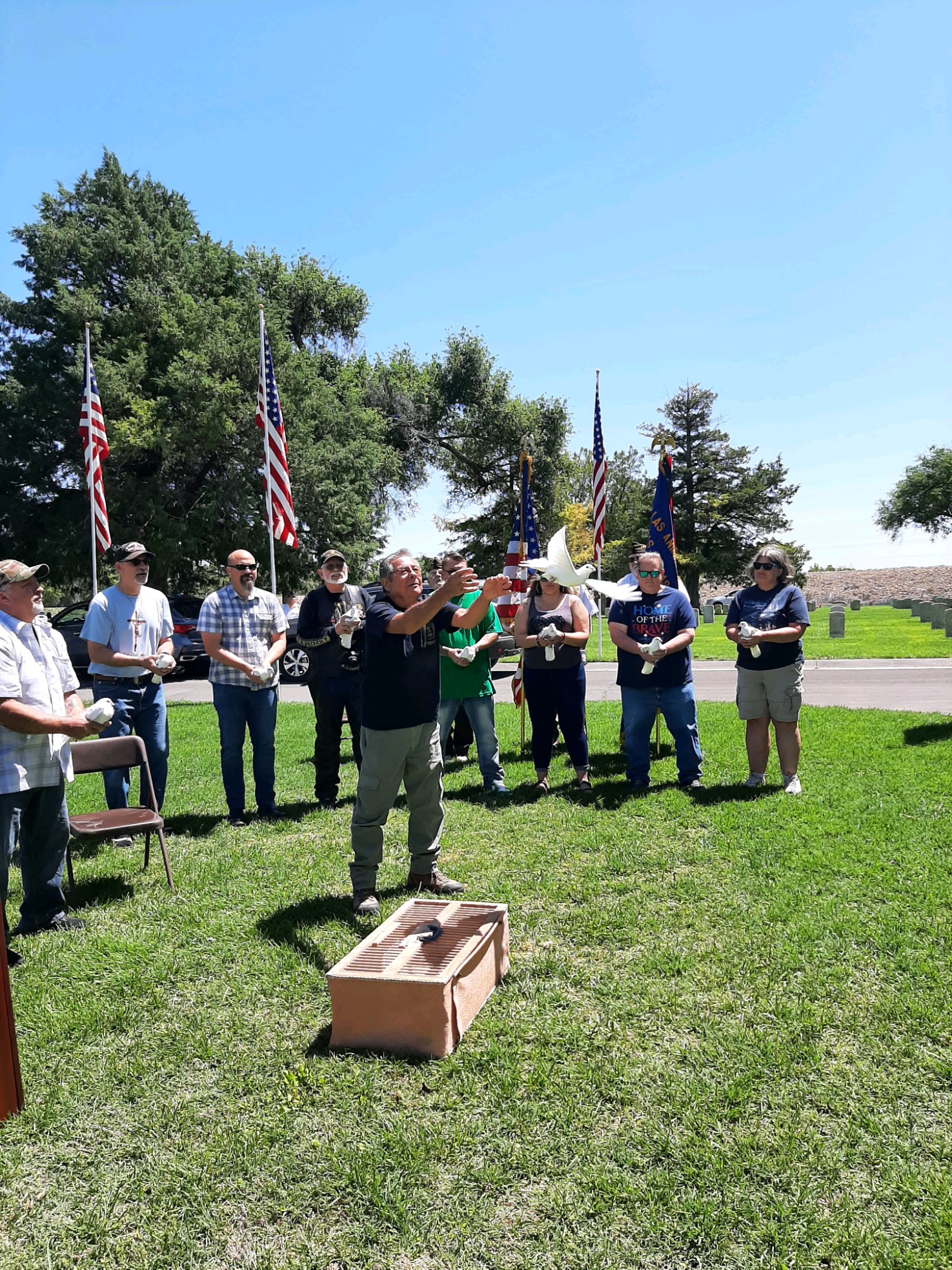 Second picture is Flavio Gallegos leading the ten volunteers in releasing the doves after the ceremony. What a beautiful conclusion!